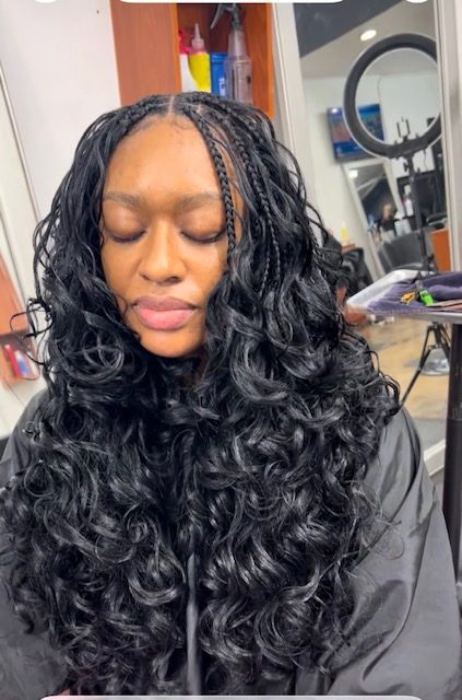 Curved stitch cornrows braided at Braids Master LA, Los Angeles